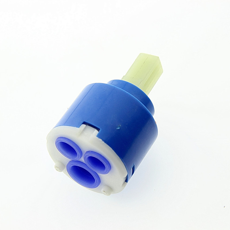 Картридж джойстик для змішування холодної та гарячої води діаметром 40 мм.